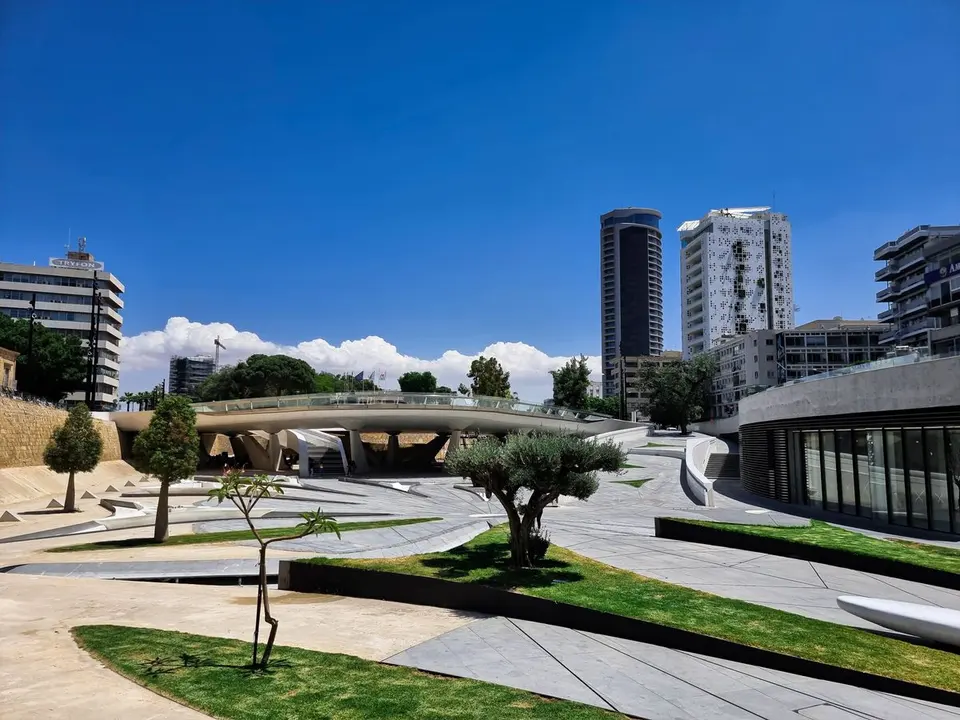 Explore the striking modern architecture and urban design of Nicosia's cityscape on a sunny day.…
