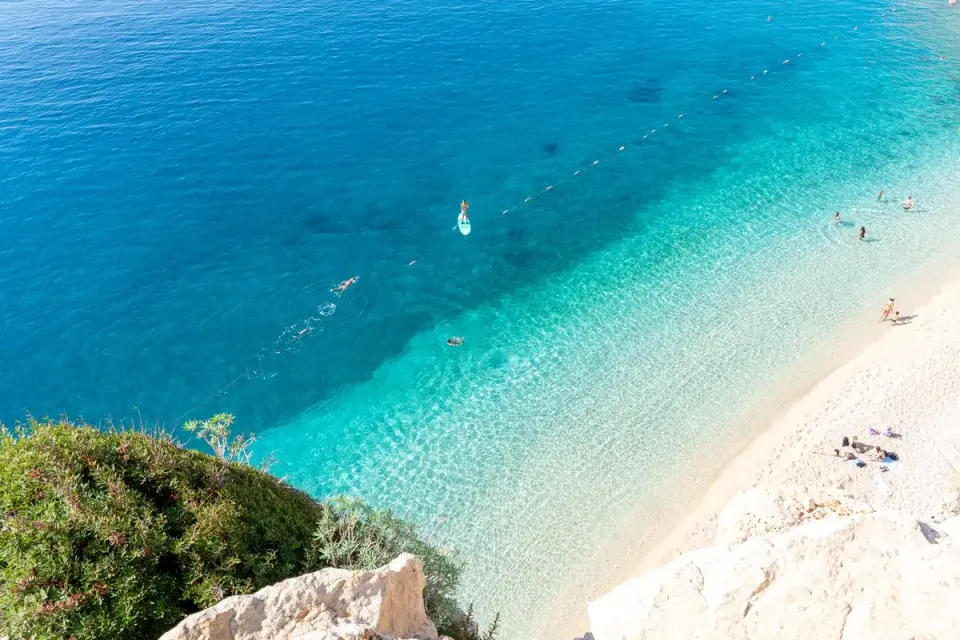 A stunning aerial view of Kaputas Beach in Antalya, Turkey, with clear turquoise waters and…