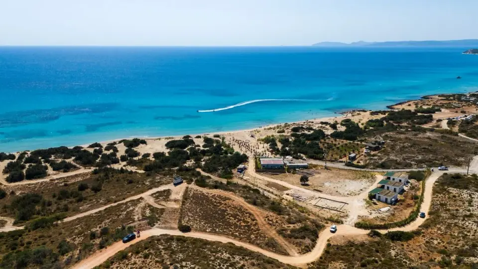 A breathtaking aerial shot of the pristine beach in Çeşme, showcasing the natural beauty of the…