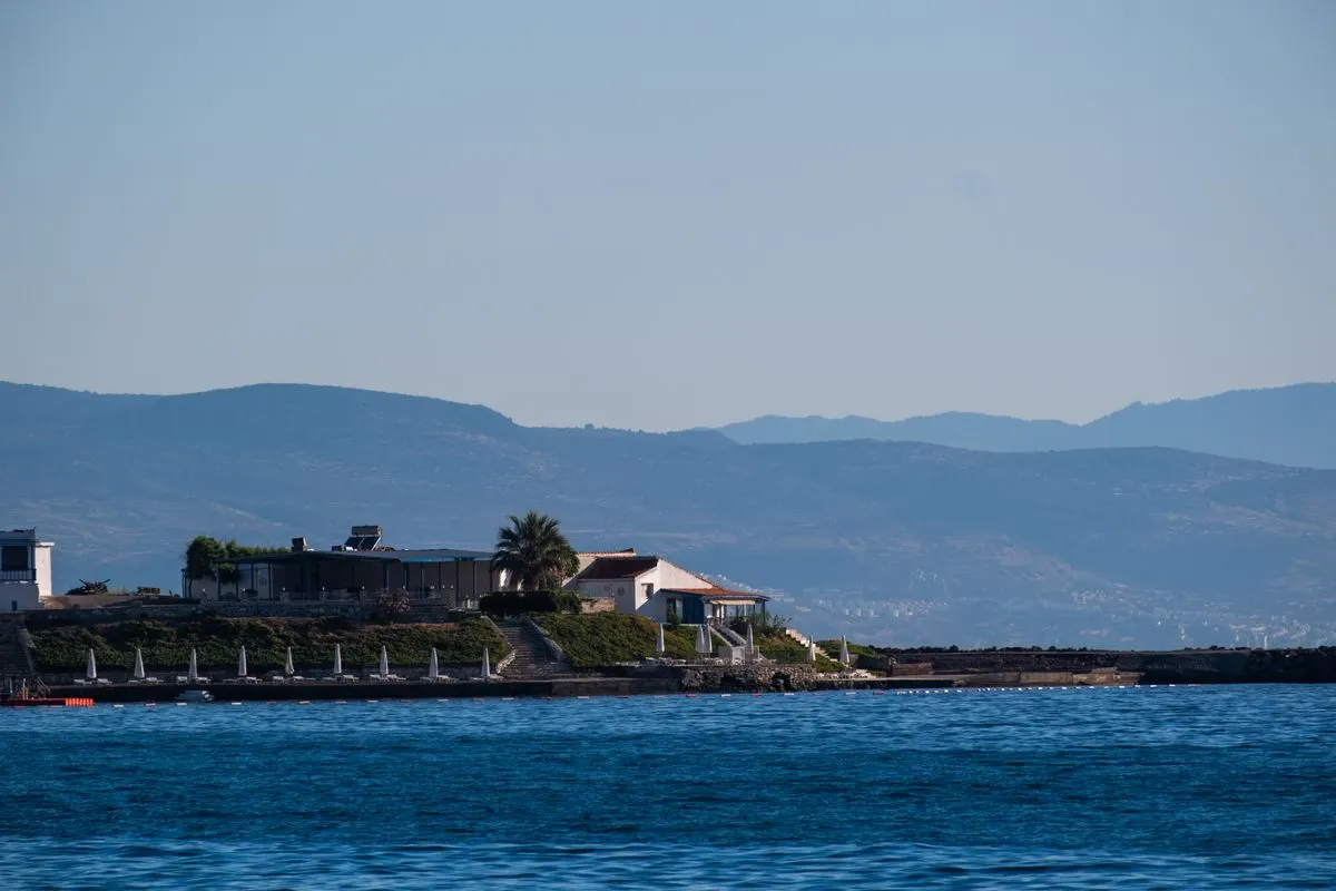 Stunning seascape of Foça, İzmir with coastal houses and mountains in the background. - Photo by…