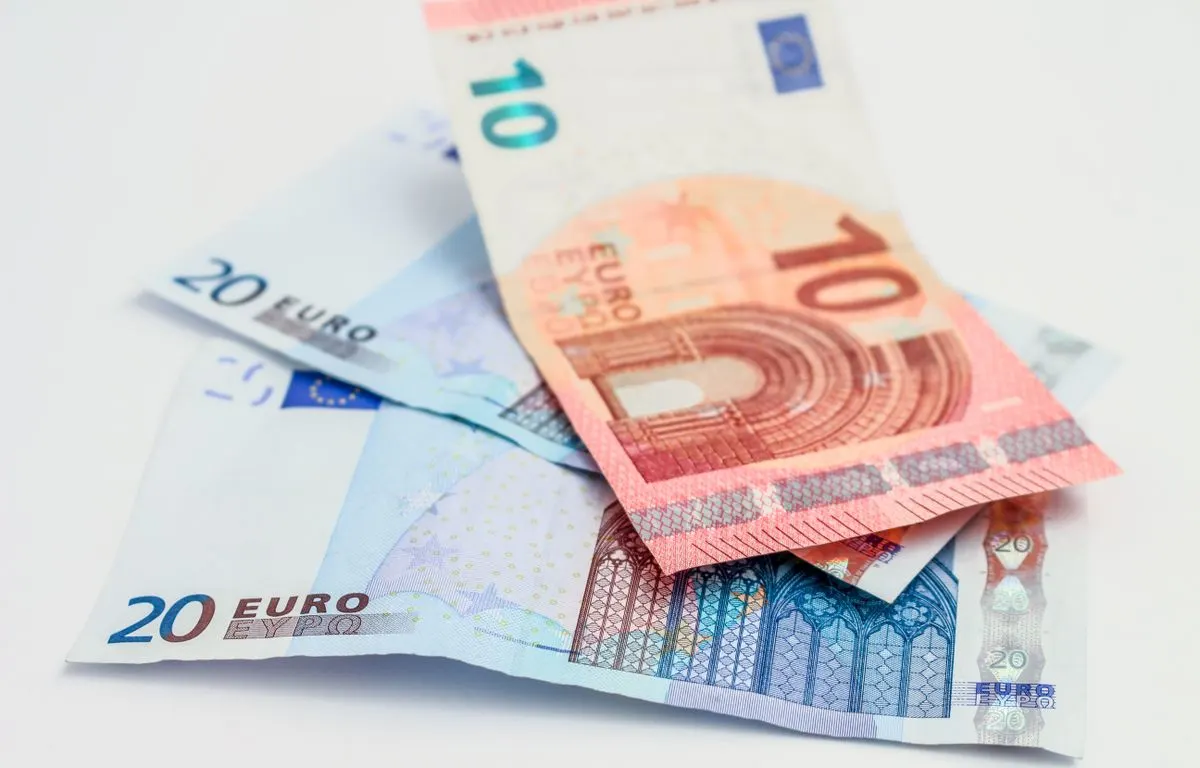 Stack of 10 and 20 euro banknotes symbolizing finance and economy. - Photo by Dom J on Pexels