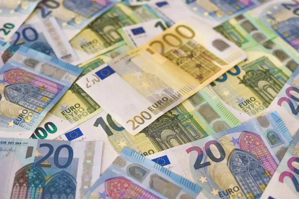 Colorful assortment of Euro banknotes in various denominations, signifying wealth and finance. -…